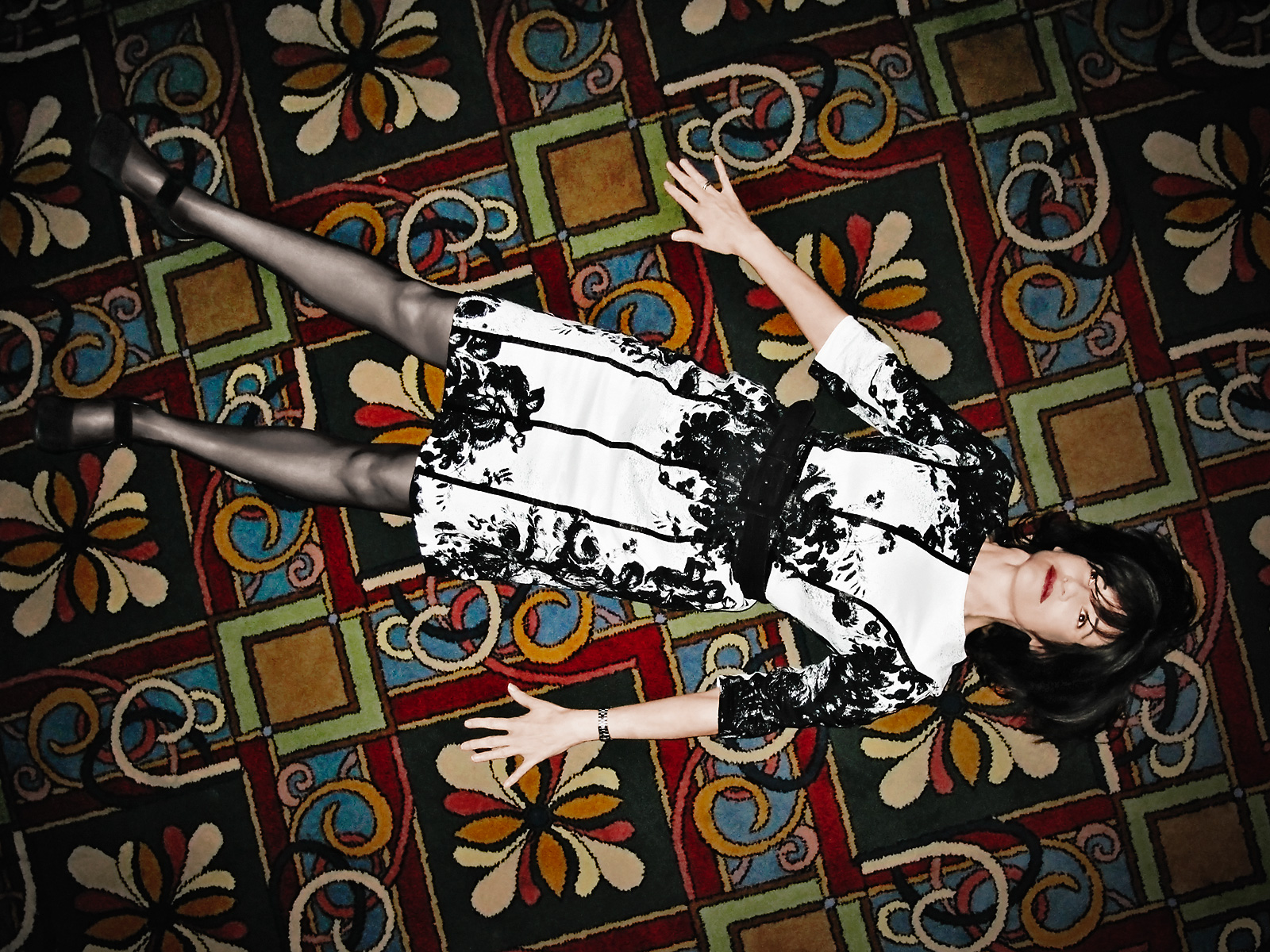 kn-in_print_dress_on_carpeted_floor-stephen-austin-welch-director-photographer