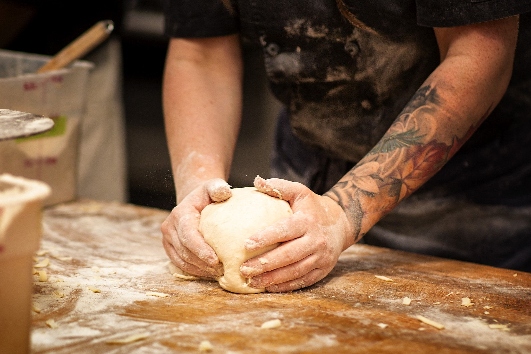 one_house_bakery-chef_baker_forming_dough_into_a-ball-stephen-austin-welch-director-photographer